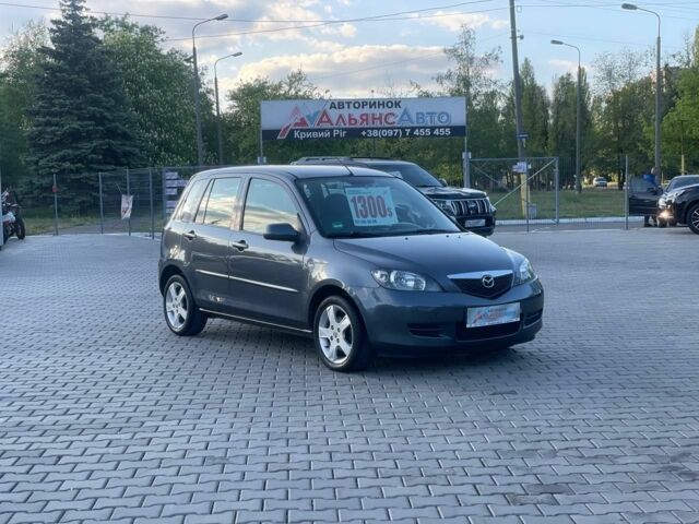 Сірий Мазда 2, об'ємом двигуна 1.4 л та пробігом 192 тис. км за 4600 $, фото 1 на Automoto.ua