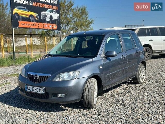 Серый Мазда 2, объемом двигателя 1.4 л и пробегом 253 тыс. км за 2450 $, фото 1 на Automoto.ua