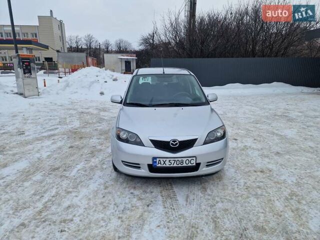 Серый Мазда 2, объемом двигателя 1.4 л и пробегом 166 тыс. км за 4150 $, фото 1 на Automoto.ua