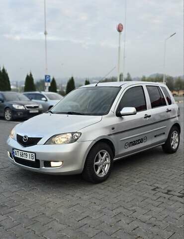 Сірий Мазда 2, об'ємом двигуна 1.4 л та пробігом 226 тис. км за 3950 $, фото 1 на Automoto.ua