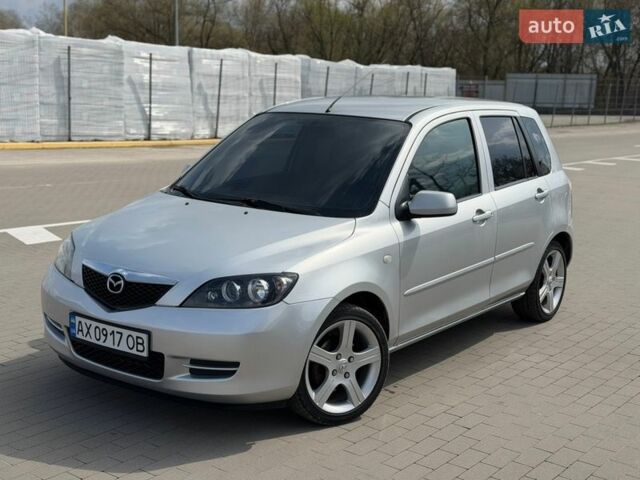 Серый Мазда 2, объемом двигателя 1.39 л и пробегом 177 тыс. км за 3850 $, фото 1 на Automoto.ua