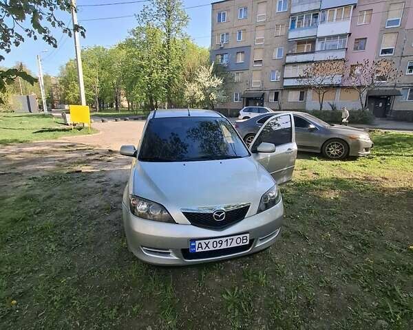 Серый Мазда 2, объемом двигателя 1.39 л и пробегом 150 тыс. км за 4800 $, фото 1 на Automoto.ua