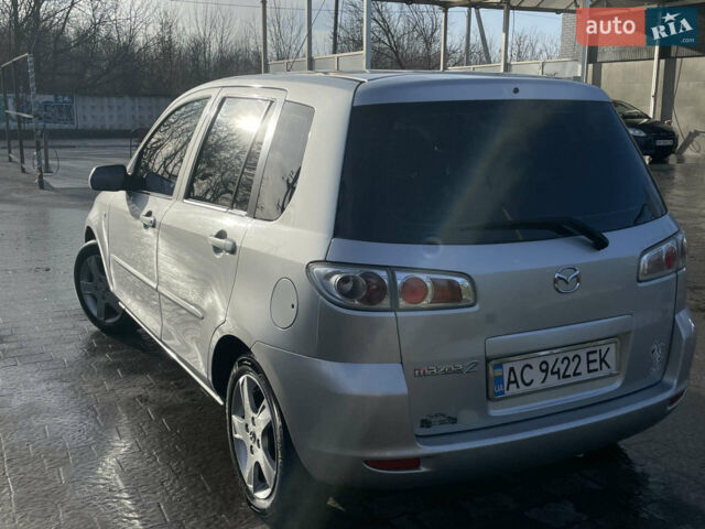 Сірий Мазда 2, об'ємом двигуна 1.39 л та пробігом 300 тис. км за 4100 $, фото 1 на Automoto.ua