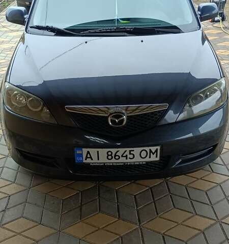 Сірий Мазда 2, об'ємом двигуна 1.4 л та пробігом 190 тис. км за 4850 $, фото 1 на Automoto.ua