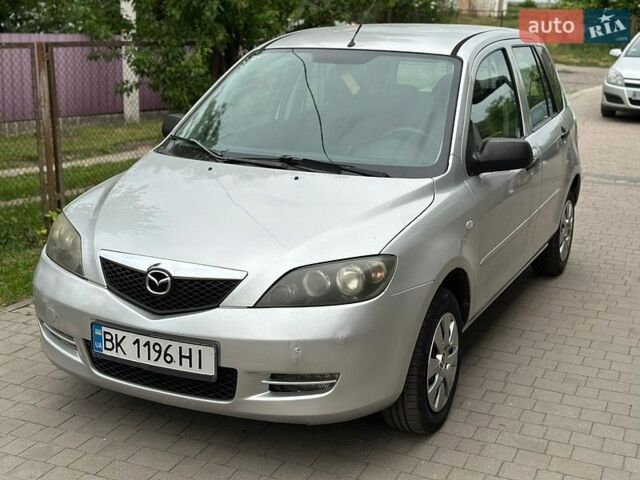 Серый Мазда 2, объемом двигателя 1.4 л и пробегом 238 тыс. км за 2600 $, фото 1 на Automoto.ua