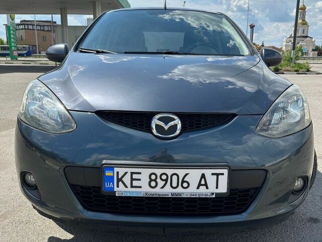 Серый Мазда 2, объемом двигателя 1.5 л и пробегом 97 тыс. км за 6200 $, фото 1 на Automoto.ua