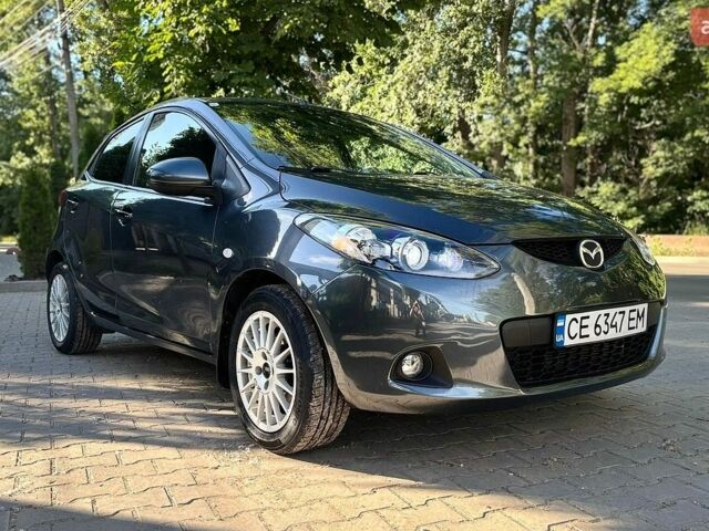 Сірий Мазда 2, об'ємом двигуна 1.35 л та пробігом 245 тис. км за 5000 $, фото 1 на Automoto.ua