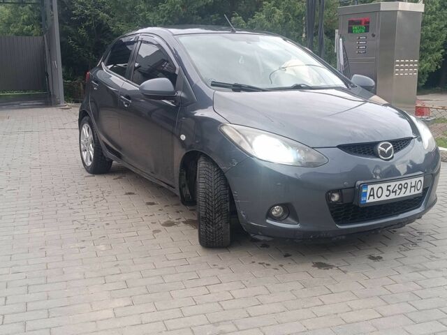 Серый Мазда 2, объемом двигателя 1.5 л и пробегом 117 тыс. км за 4600 $, фото 1 на Automoto.ua