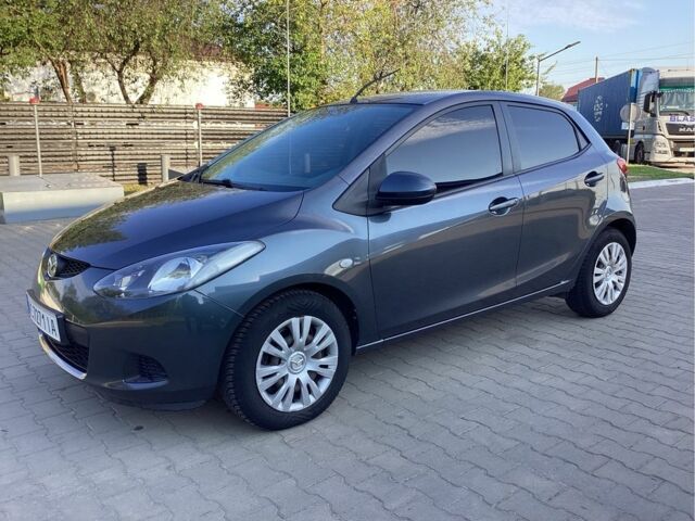 Серый Мазда 2, объемом двигателя 1.4 л и пробегом 181 тыс. км за 4200 $, фото 1 на Automoto.ua
