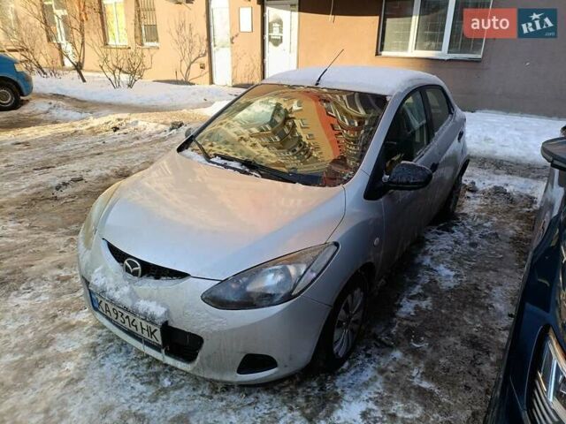 Серый Мазда 2, объемом двигателя 1.4 л и пробегом 240 тыс. км за 4299 $, фото 1 на Automoto.ua