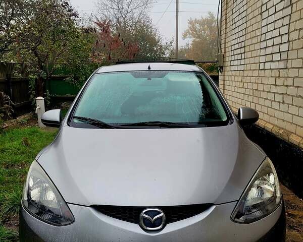 Серый Мазда 2, объемом двигателя 1.3 л и пробегом 244 тыс. км за 5200 $, фото 1 на Automoto.ua