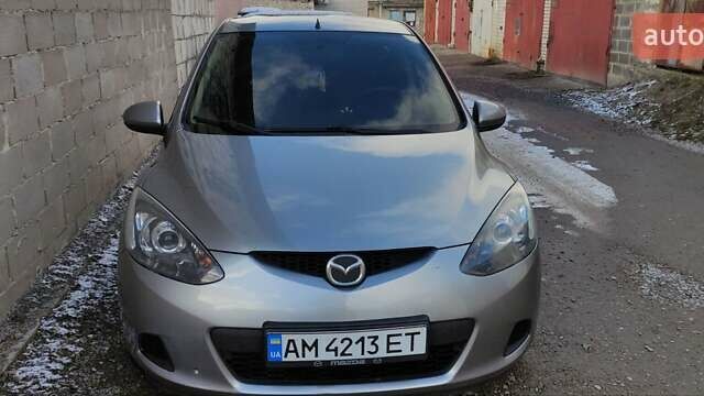 Серый Мазда 2, объемом двигателя 1.35 л и пробегом 176 тыс. км за 4750 $, фото 1 на Automoto.ua