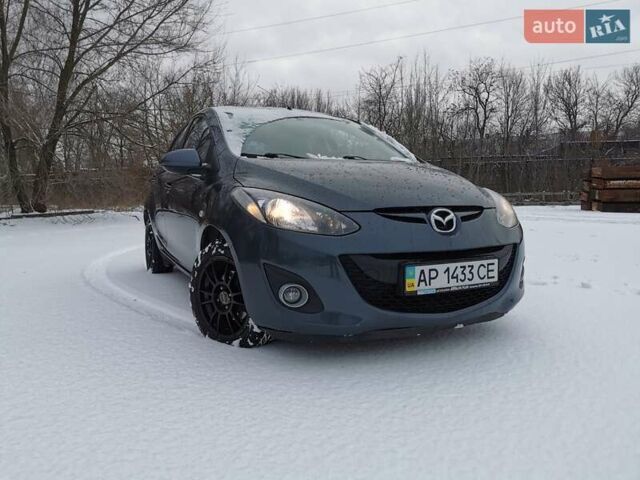 Серый Мазда 2, объемом двигателя 1.5 л и пробегом 178 тыс. км за 6050 $, фото 1 на Automoto.ua