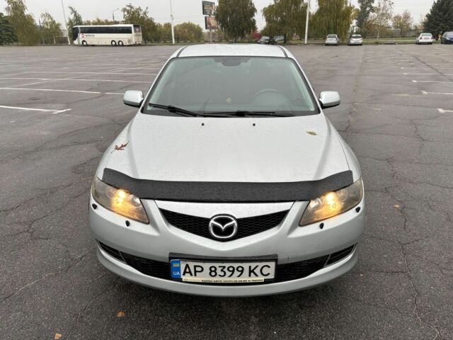Сірий Мазда 2, об'ємом двигуна 2 л та пробігом 210 тис. км за 6194 $, фото 1 на Automoto.ua