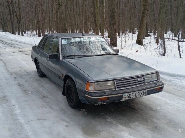 Синий Мазда 2, объемом двигателя 0.2 л и пробегом 888 тыс. км за 904 $, фото 1 на Automoto.ua