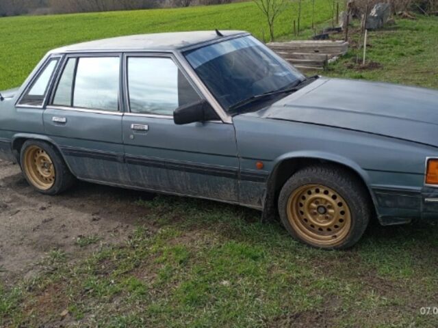 Синий Мазда 2, объемом двигателя 0.2 л и пробегом 888 тыс. км за 700 $, фото 1 на Automoto.ua