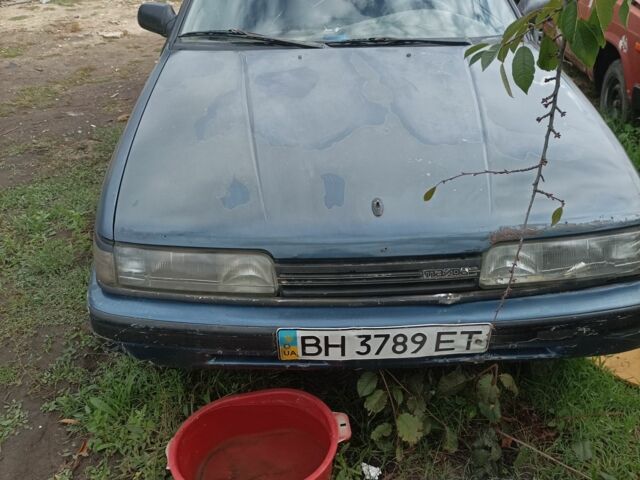 Синий Мазда 2, объемом двигателя 2 л и пробегом 373 тыс. км за 576 $, фото 1 на Automoto.ua