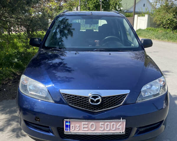 Синий Мазда 2, объемом двигателя 1.4 л и пробегом 225 тыс. км за 3950 $, фото 1 на Automoto.ua