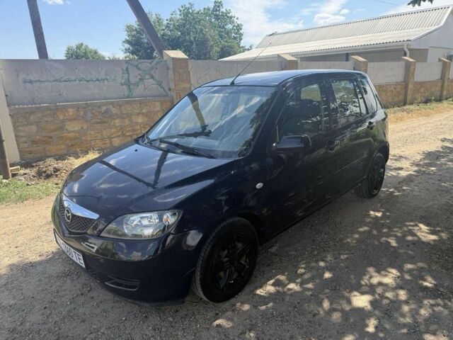 Синій Мазда 2, об'ємом двигуна 1.4 л та пробігом 208 тис. км за 3850 $, фото 1 на Automoto.ua
