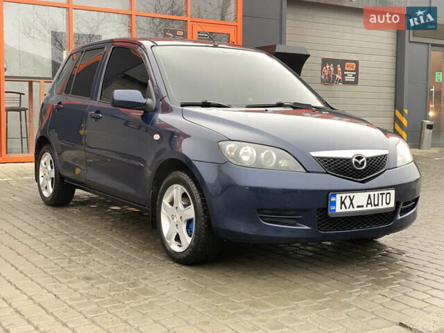 Синий Мазда 2, объемом двигателя 1.4 л и пробегом 185 тыс. км за 5700 $, фото 1 на Automoto.ua