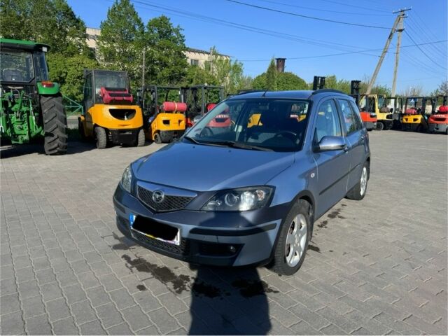Синій Мазда 2, об'ємом двигуна 1.4 л та пробігом 135 тис. км за 1899 $, фото 1 на Automoto.ua