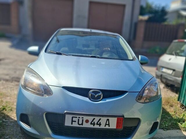 Синій Мазда 2, об'ємом двигуна 1.3 л та пробігом 214 тис. км за 3800 $, фото 1 на Automoto.ua
