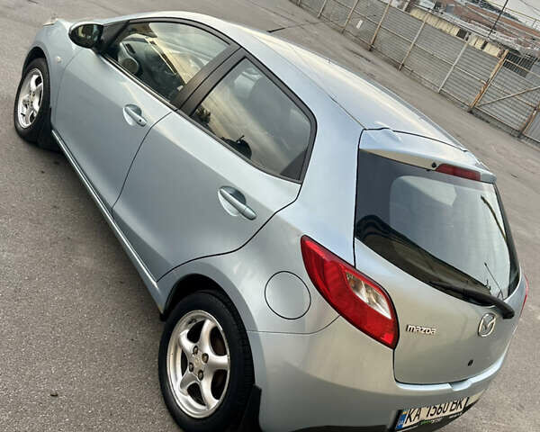 Синий Мазда 2, объемом двигателя 1.3 л и пробегом 182 тыс. км за 4500 $, фото 1 на Automoto.ua