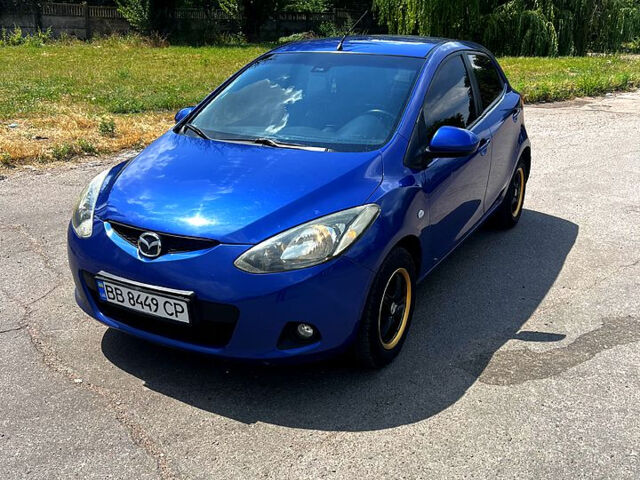Синій Мазда 2, об'ємом двигуна 1.5 л та пробігом 185 тис. км за 5500 $, фото 1 на Automoto.ua