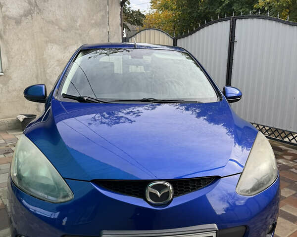 Синий Мазда 2, объемом двигателя 1.5 л и пробегом 103 тыс. км за 8000 $, фото 1 на Automoto.ua