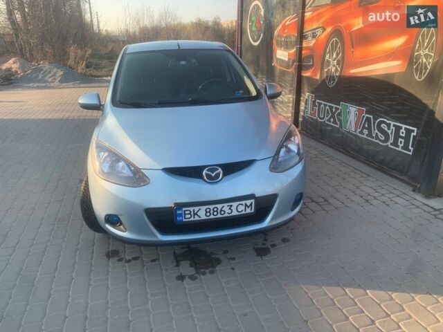 Синий Мазда 2, объемом двигателя 1.3 л и пробегом 198 тыс. км за 5200 $, фото 1 на Automoto.ua