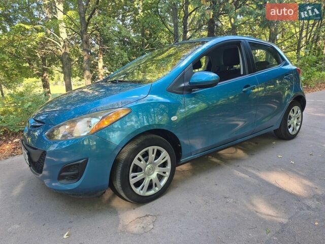 Синий Мазда 2, объемом двигателя 1.5 л и пробегом 82 тыс. км за 7500 $, фото 1 на Automoto.ua
