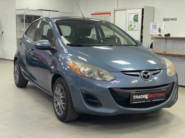 Синий Мазда 2, объемом двигателя 1.5 л и пробегом 166 тыс. км за 6790 $, фото 1 на Automoto.ua