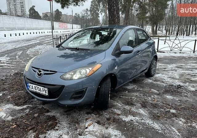 Синий Мазда 2, объемом двигателя 1.5 л и пробегом 166 тыс. км за 8200 $, фото 1 на Automoto.ua