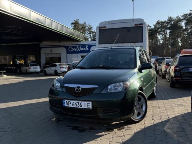 Зеленый Мазда 2, объемом двигателя 1.4 л и пробегом 125 тыс. км за 3100 $, фото 1 на Automoto.ua