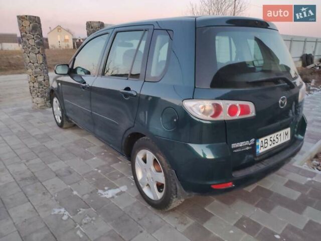 Зелений Мазда 2, об'ємом двигуна 1.3 л та пробігом 175 тис. км за 4600 $, фото 1 на Automoto.ua