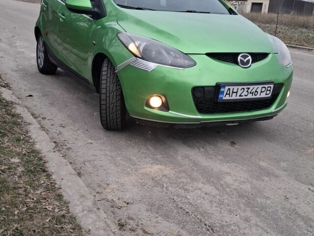 Зеленый Мазда 2, объемом двигателя 1.3 л и пробегом 198 тыс. км за 4800 $, фото 1 на Automoto.ua