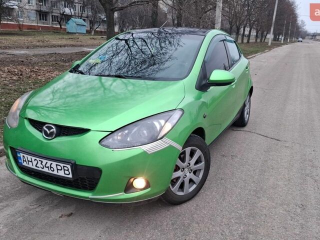 Зеленый Мазда 2, объемом двигателя 1.35 л и пробегом 200 тыс. км за 4000 $, фото 1 на Automoto.ua