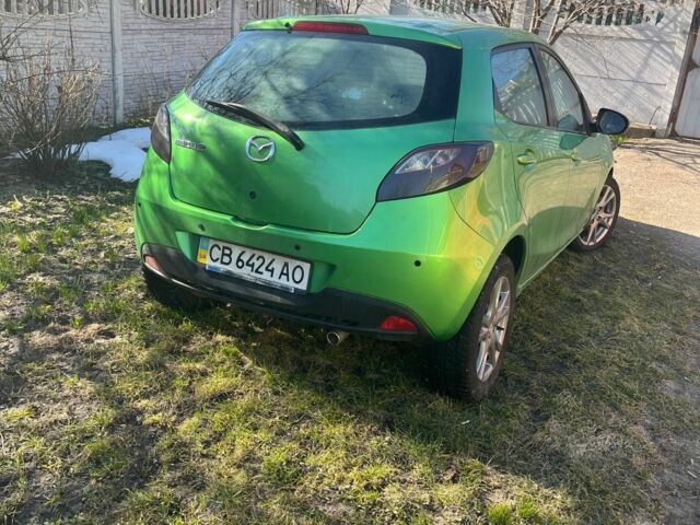 Зелений Мазда 2, об'ємом двигуна 1.5 л та пробігом 104 тис. км за 5700 $, фото 1 на Automoto.ua
