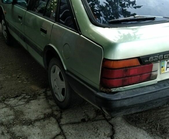 Зелений Мазда 2, об'ємом двигуна 2 л та пробігом 3 тис. км за 600 $, фото 1 на Automoto.ua