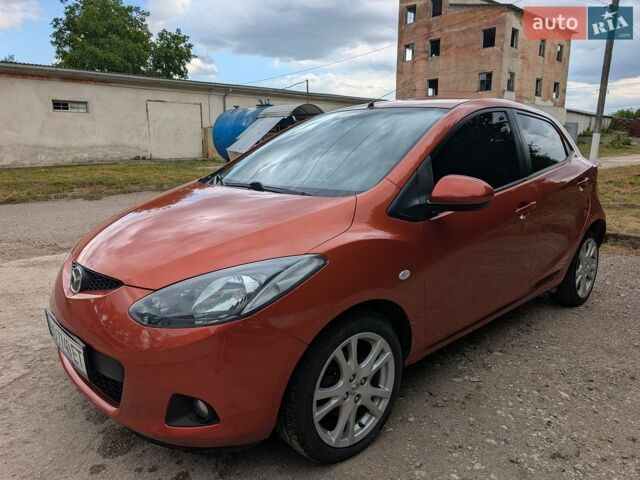 Оранжевый Мазда 2, объемом двигателя 1.5 л и пробегом 270 тыс. км за 5750 $, фото 1 на Automoto.ua