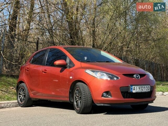 Помаранчевий Мазда 2, об'ємом двигуна 1.5 л та пробігом 119 тис. км за 6200 $, фото 1 на Automoto.ua