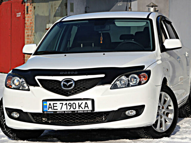 Белый Мазда 3, объемом двигателя 1.6 л и пробегом 150 тыс. км за 6700 $, фото 1 на Automoto.ua