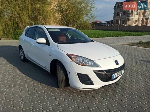 Белый Мазда 3, объемом двигателя 1.56 л и пробегом 230 тыс. км за 6500 $, фото 1 на Automoto.ua