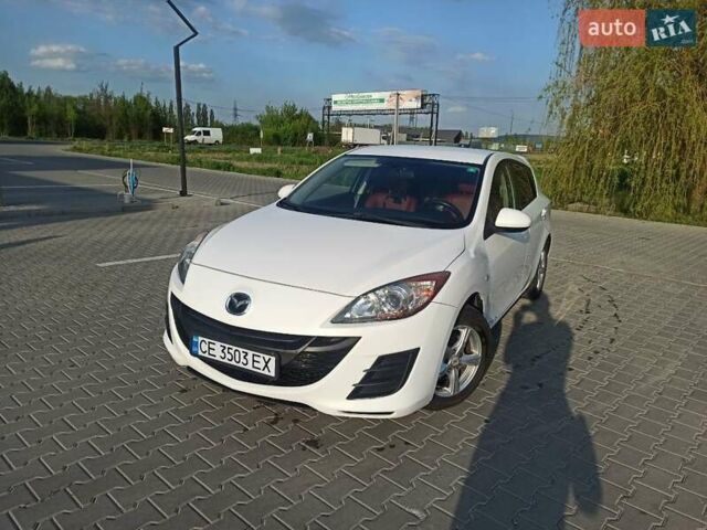 Белый Мазда 3, объемом двигателя 1.56 л и пробегом 230 тыс. км за 6500 $, фото 1 на Automoto.ua