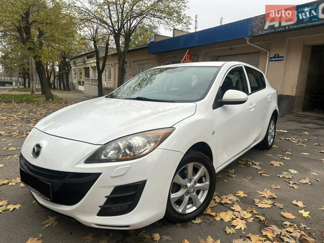 Белый Мазда 3, объемом двигателя 1.6 л и пробегом 130 тыс. км за 7200 $, фото 1 на Automoto.ua