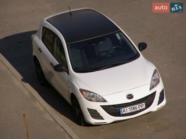 Білий Мазда 3, об'ємом двигуна 1.6 л та пробігом 230 тис. км за 7200 $, фото 1 на Automoto.ua