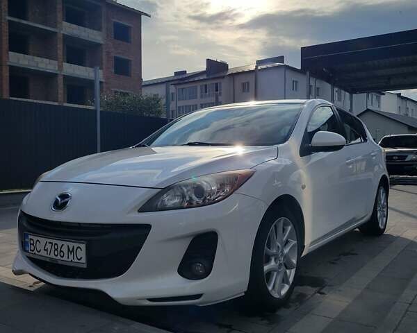 Білий Мазда 3, об'ємом двигуна 1.56 л та пробігом 228 тис. км за 7700 $, фото 1 на Automoto.ua