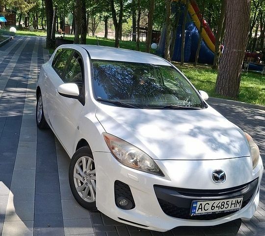 Белый Мазда 3, объемом двигателя 1.6 л и пробегом 143 тыс. км за 7777 $, фото 1 на Automoto.ua