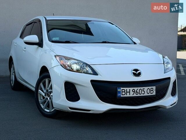 Белый Мазда 3, объемом двигателя 2 л и пробегом 208 тыс. км за 6990 $, фото 1 на Automoto.ua