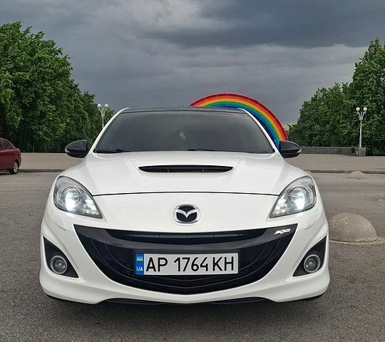 Белый Мазда 3, объемом двигателя 2.26 л и пробегом 180 тыс. км за 10000 $, фото 1 на Automoto.ua